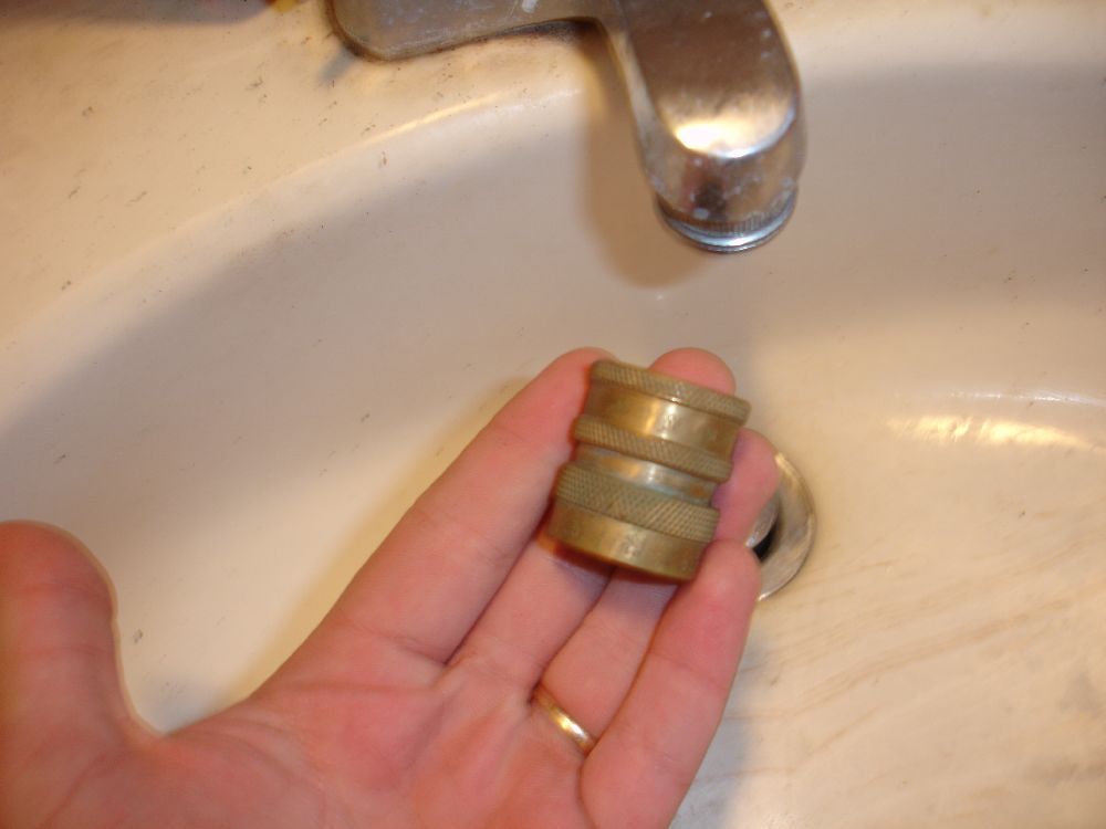 This screws into my faucet, and hose quick snaps into place.