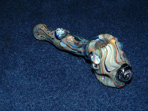 Single doughnut Hammer blown by the same artist as the sidecar. Also from Sylvan. This one knocks you upside the head, and has a very cool bubble in a dichronic bead that resembles a meteor hitting the ocean. Thus 