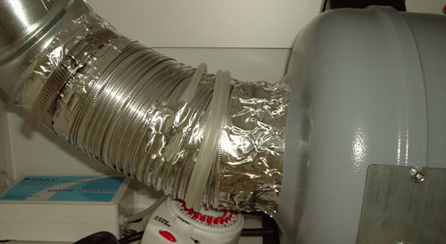 then the ozone generator's tubing is secured in place with some aluminum tape