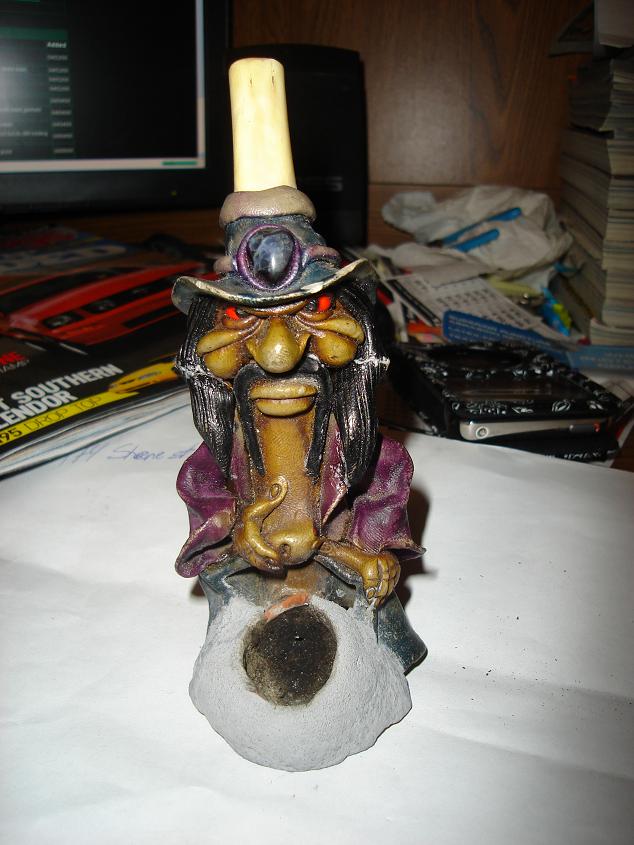 Mr. Tiki! only the Bestest pipe ever lol the bowl broke so i fixed it with some grout i think its a good fix. Time for a BOWL! *high times*