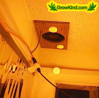 A vent in the ceiling, with fan, takes hot air immediatly outside. Air fresheners help remove odor.